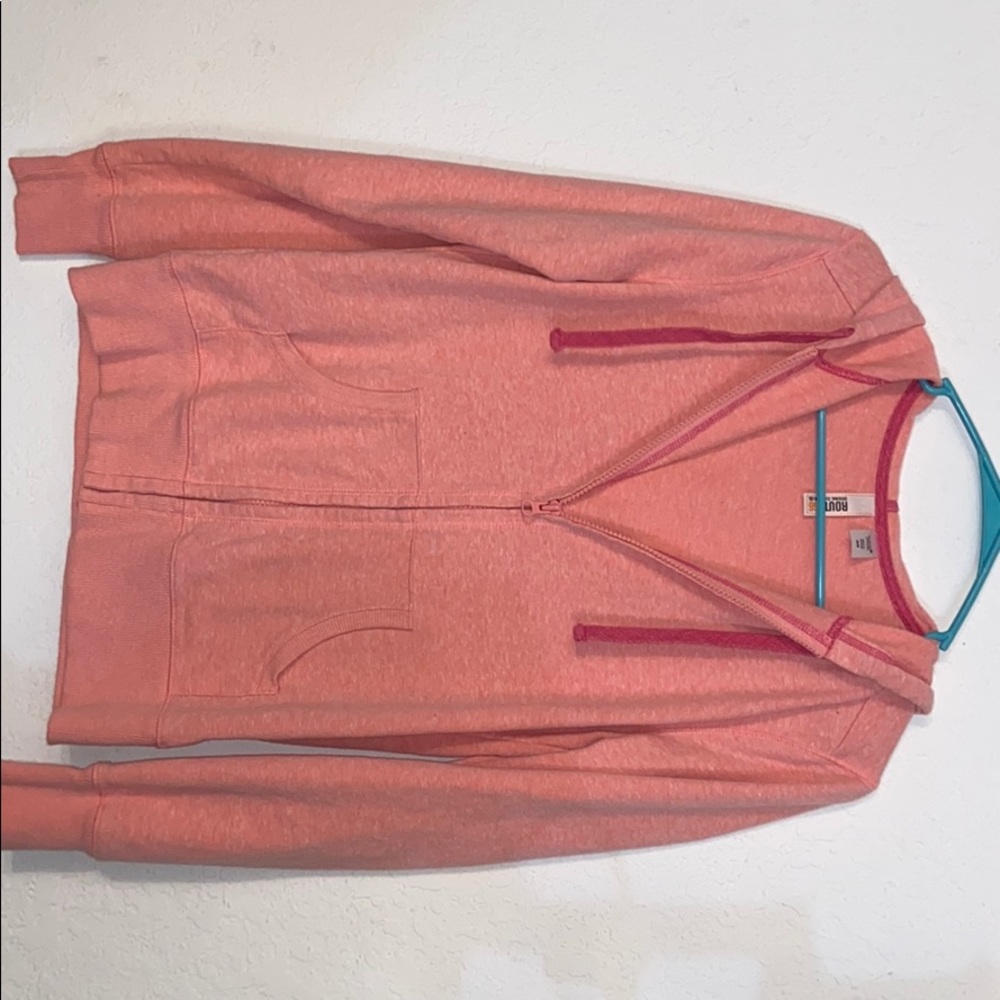 peach/pink zip up jacket